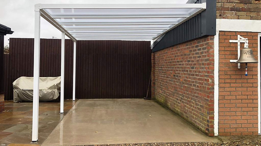 An example of a lean-to car port installation by Bosomworth Glass in Scarborough